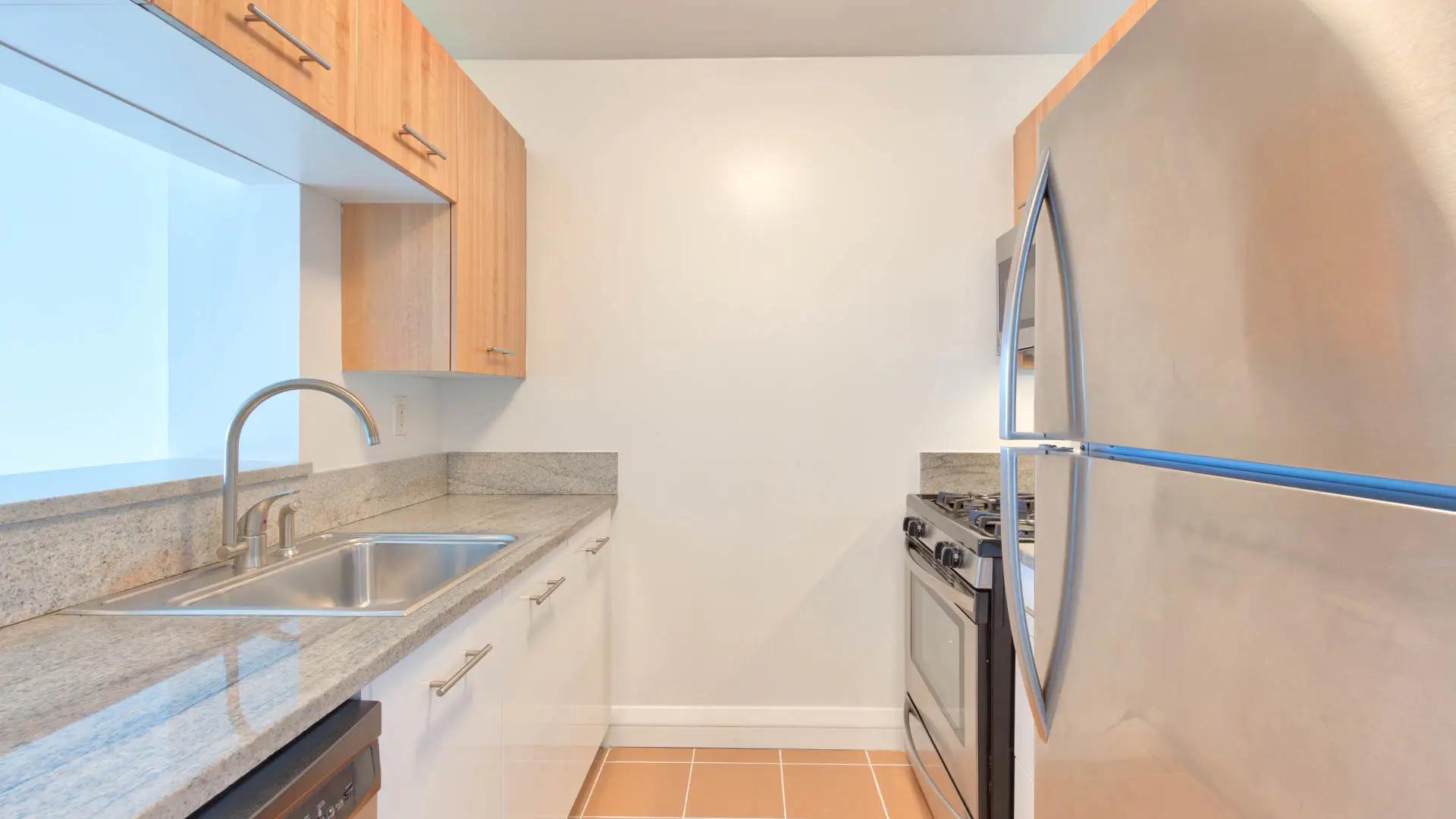 https://media.equityapartments.com/images/q_50/f_auto/fl_lossy/4128-34/800-Sixth-Apartments-Kitchen.webp